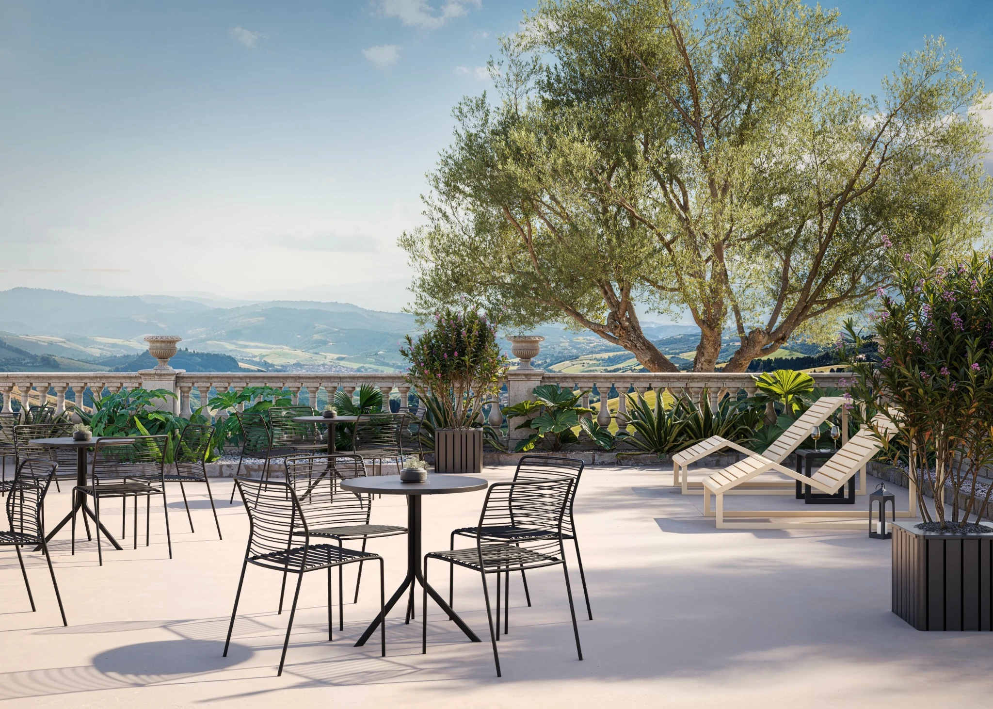 Oreka outdoor tables paired with Libra Wire chairs on a terrace
